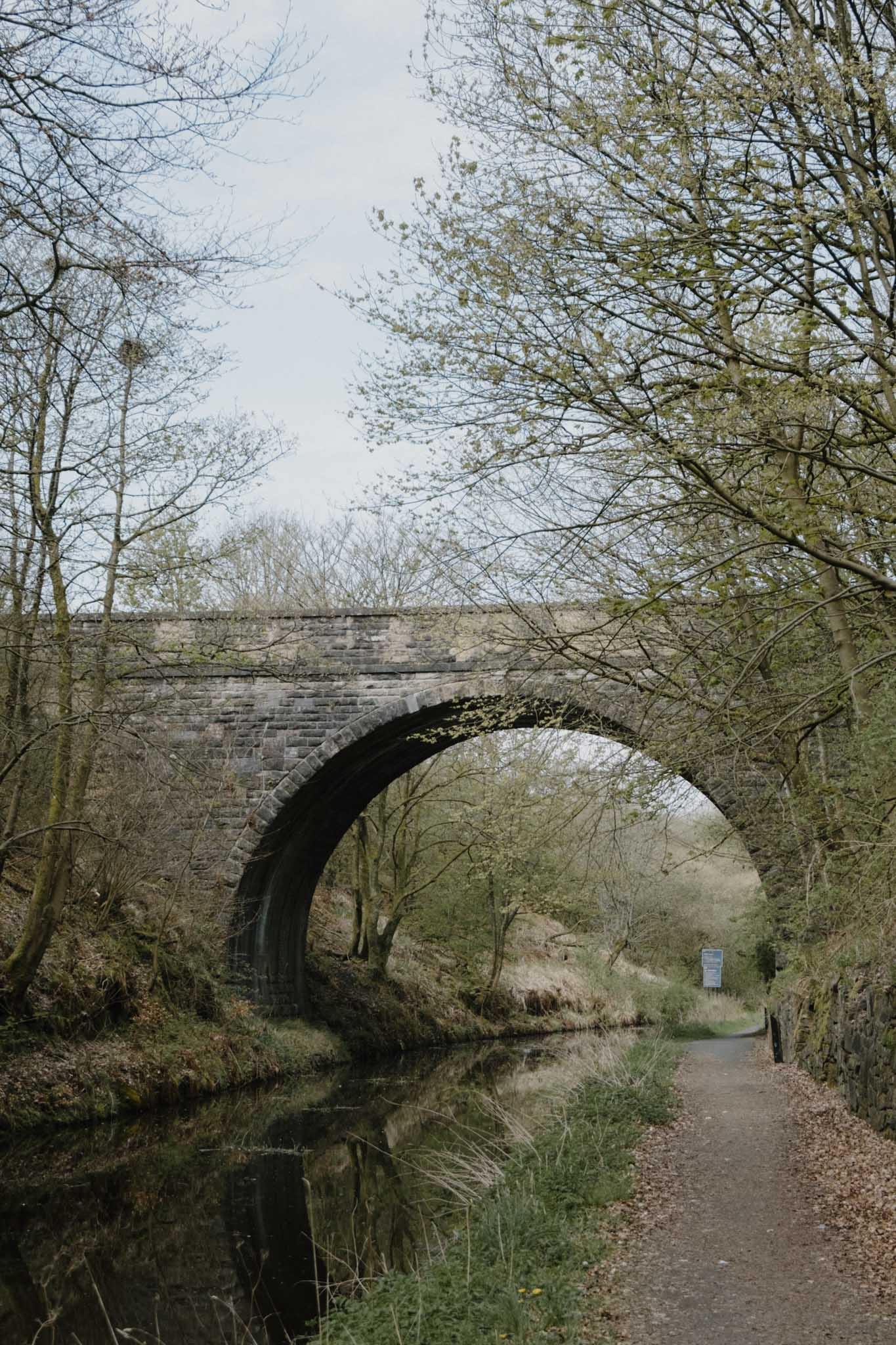 Arched stone bridge over the canal